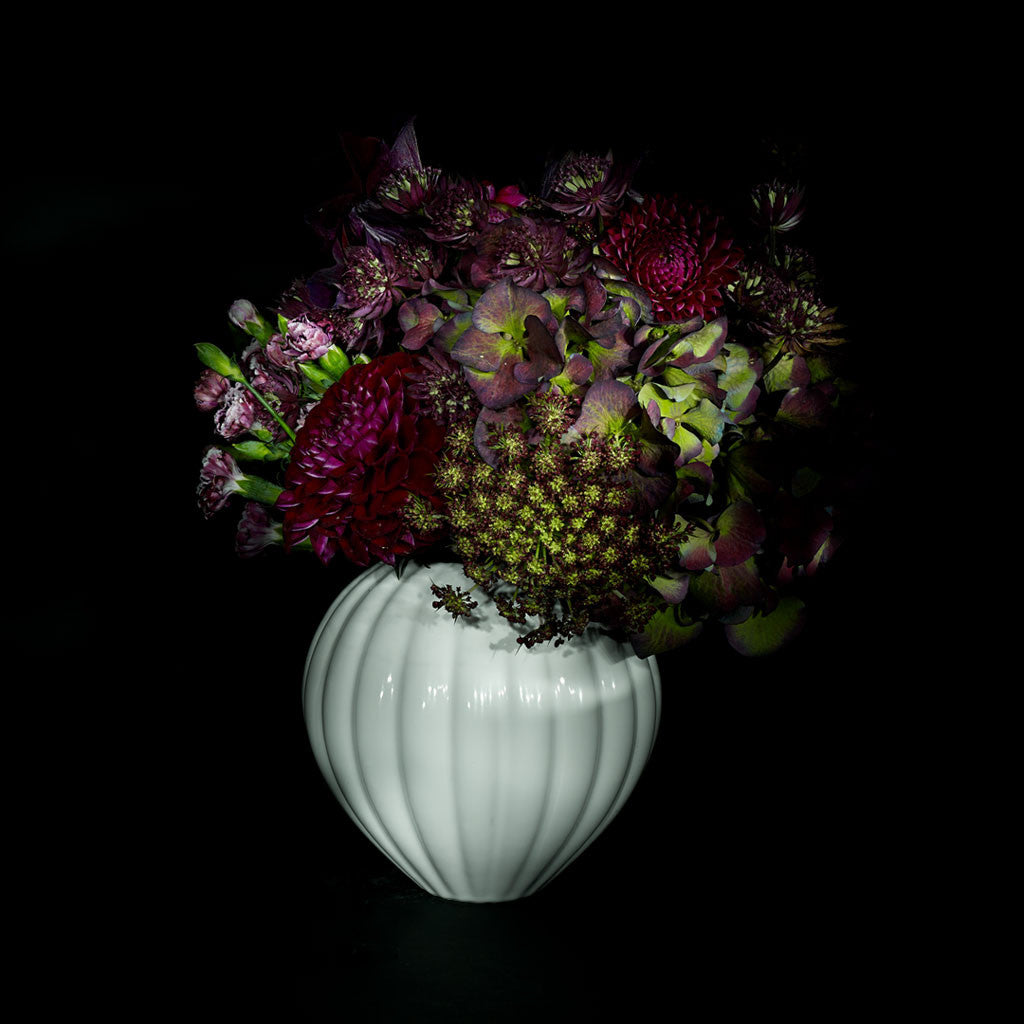 The Montgolfiere Vase with red flowers